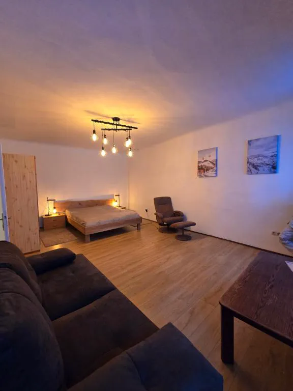 The wood-accented bedroom and lounge at Sager House